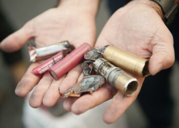 Orange County Fire Authority spokesperson Capt. Steve Concialdi holds the broken pieces of a modified electronic cigarette that exploded in Chris Brookins' hands. During a press conference, Brookins recounts the incident on Tuesday morning in Santa Ana after he was burned by an exploded electronic cigarette late Sunday night. 

////ADDITIONAL INFO:  -   05.ecigexplosions.ks   -  Day: Tuesday - Date: 3/10/15  -  Time: 9:39:34 AM  -   Original file name: _KSA9878.NEF  -  KEN STEINHARDT, ORANGE COUNTY REGISTER --  Chris Brookins, 29 and Sean Schoepflin