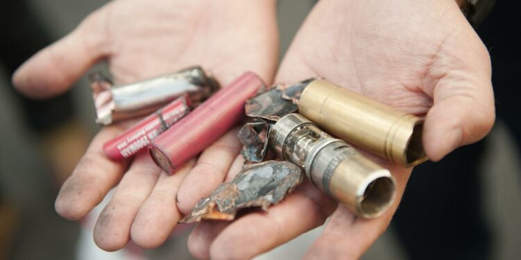 Orange County Fire Authority spokesperson Capt. Steve Concialdi holds the broken pieces of a modified electronic cigarette that exploded in Chris Brookins' hands. During a press conference, Brookins recounts the incident on Tuesday morning in Santa Ana after he was burned by an exploded electronic cigarette late Sunday night. 

////ADDITIONAL INFO:  -   05.ecigexplosions.ks   -  Day: Tuesday - Date: 3/10/15  -  Time: 9:39:34 AM  -   Original file name: _KSA9878.NEF  -  KEN STEINHARDT, ORANGE COUNTY REGISTER --  Chris Brookins, 29 and Sean Schoepflin